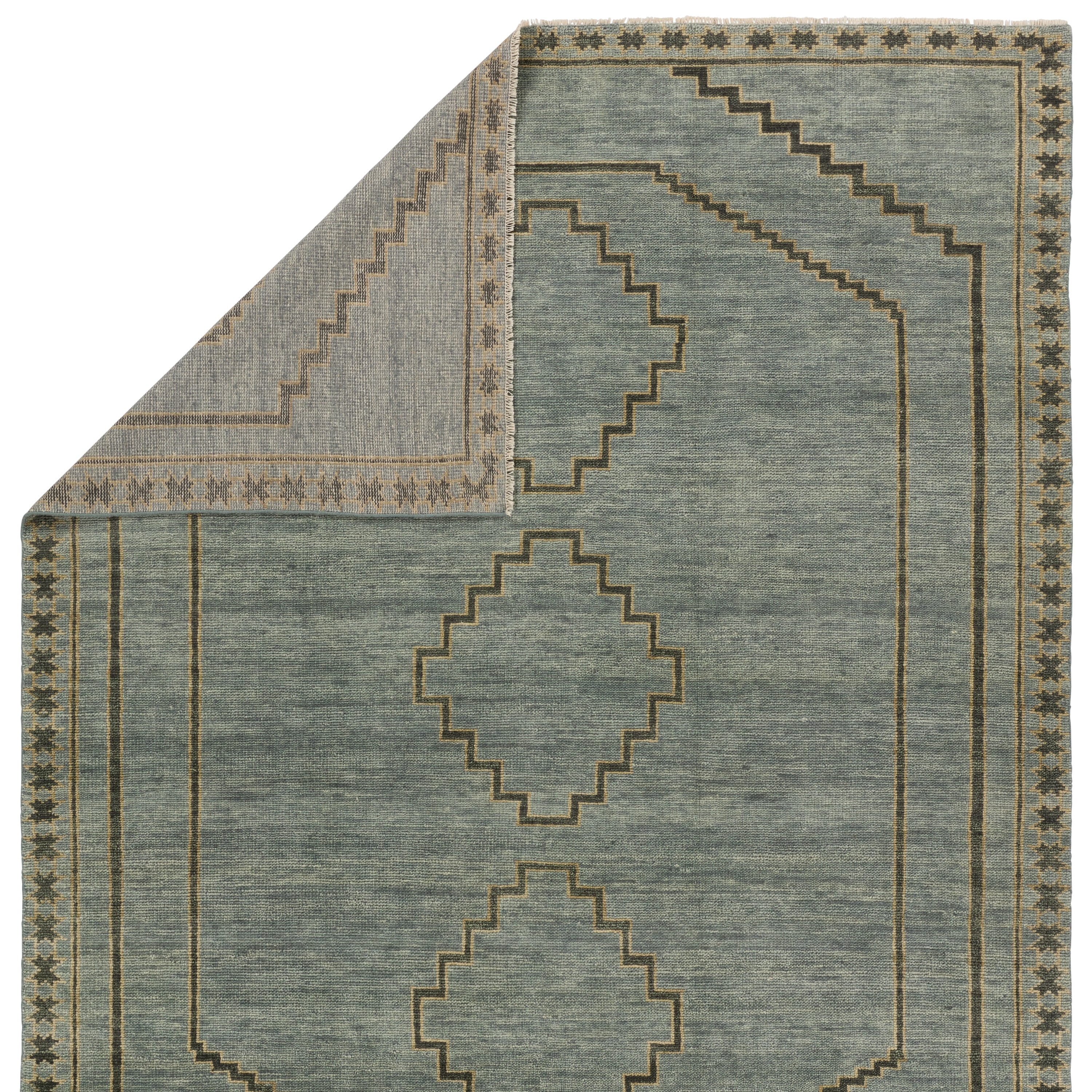 Featuring Cyprus Paphos Hand-Knotted Rug by Jaipur Living at Amethyst Home. The hand-knotted Cyprus collection showcases a modern representation of vintage Kars designs with clean-lined geometric details and fresh colorways. The blue, gray and sage green Paphos design delights with a minimalistic medallion pattern and a similarly styled border. Low pile and naturally stain resist. Amethyst Home provides interior design, new construction, custom furniture, and area rugs in the Calabasas metro area.