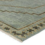 Featuring Cyprus Paphos Hand-Knotted Rug by Jaipur Living at Amethyst Home. The hand-knotted Cyprus collection showcases a modern representation of vintage Kars designs with clean-lined geometric details and fresh colorways. The blue, gray and sage green Paphos design delights with a minimalistic medallion pattern and a similarly styled border. Low pile and naturally stain resistant . Amethyst Home provides interior design, new construction, custom furniture, and area rugs in the Omaha metro area.