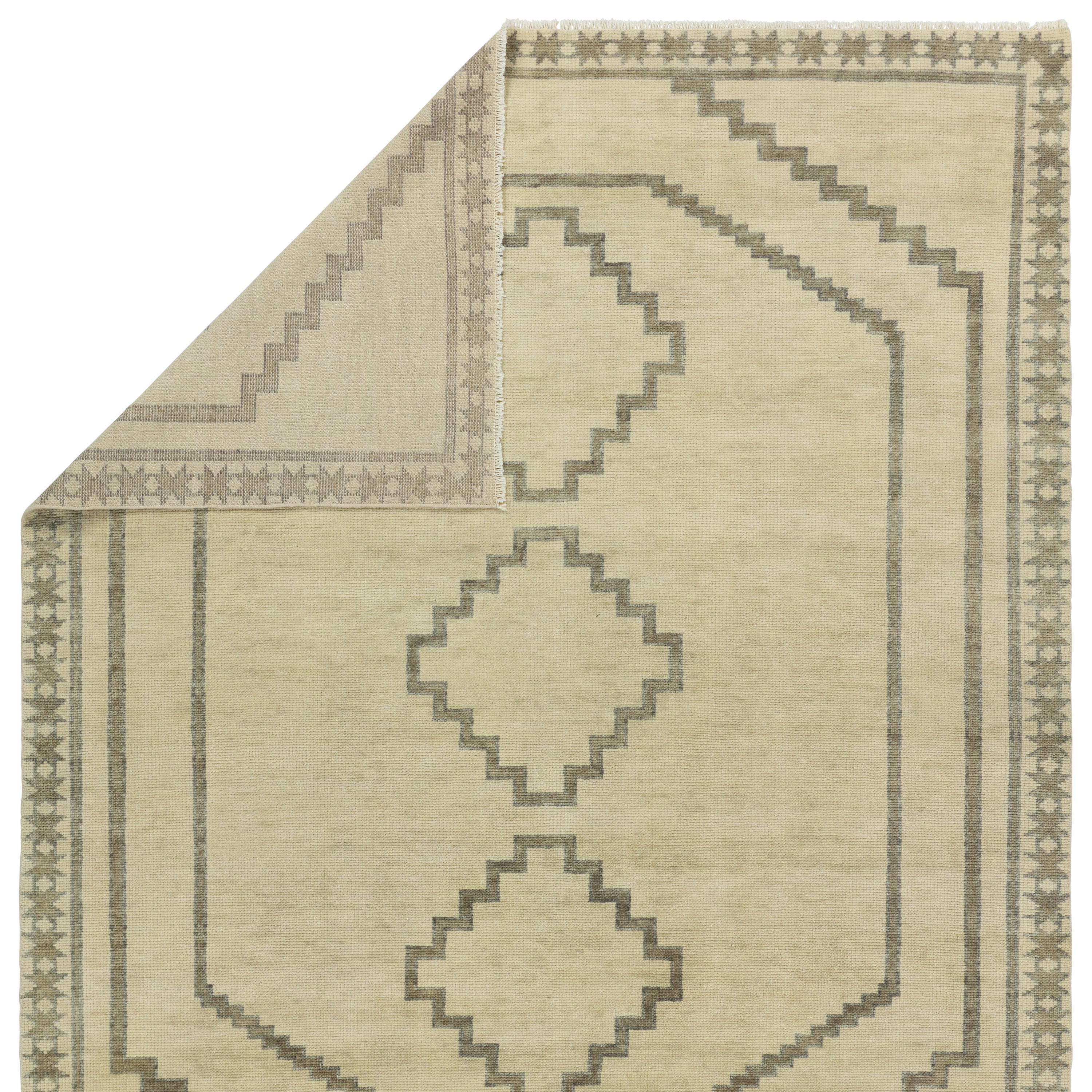 Featuring Cyprus Green Paphos Hand-Knotted Rug by Jaipur Living at Amethyst Home. The hand-knotted Cyprus collection showcases a modern representation of vintage Kars designs with clean-lined geometric details and fresh colorways. The dark and light green Paphos design delights with a minimalistic medallion pattern and a similarly styled border. Low pile and naturally stain resis. Amethyst Home provides interior design, new construction, custom furniture, and area rugs in the Calabasas metro area.