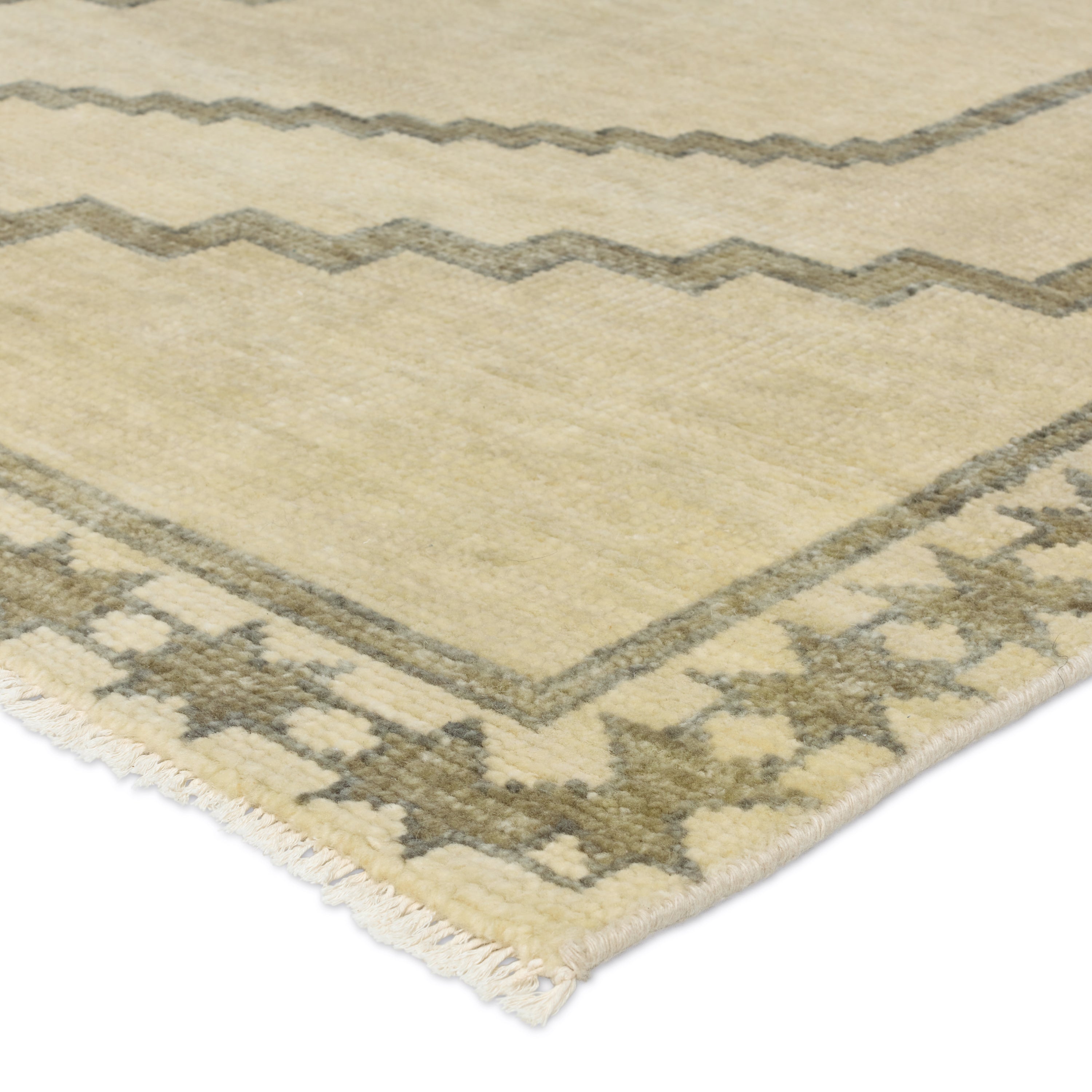 Featuring Cyprus Green Paphos Hand-Knotted Rug by Jaipur Living at Amethyst Home. The hand-knotted Cyprus collection showcases a modern representation of vintage Kars designs with clean-lined geometric details and fresh colorways. The dark and light green Paphos design delights with a minimalistic medallion pattern and a similarly styled border. Low pile and naturally stain resi. Amethyst Home provides interior design, new construction, custom furniture, and area rugs in the Des Moines metro area.