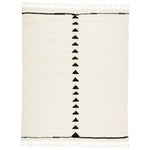 Featuring Desouk Vendace Rug by Jaipur Living at Amethyst Home. The Desouk collection melds modern allure with the global vibes of Morocco. The Vendace hand-knotted rug showcases a geometric linear pattern with contrasting black and cream tones. This handcrafted rug boasts plush, cut wool pile that pairs beautifully with braided tassel details. Perfect for adding warmth to cozy bedrooms and sit. Amethyst Home provides interior design services, furniture, rugs, and lighting in the Omaha metro area.