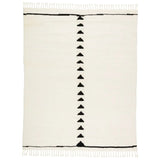 Featuring Desouk Vendace Rug by Jaipur Living at Amethyst Home. The Desouk collection melds modern allure with the global vibes of Morocco. The Vendace hand-knotted rug showcases a geometric linear pattern with contrasting black and cream tones. This handcrafted rug boasts plush, cut wool pile that pairs beautifully with braided tassel details. Perfect for adding warmth to cozy bedrooms and sit. Amethyst Home provides interior design services, furniture, rugs, and lighting in the Omaha metro area.