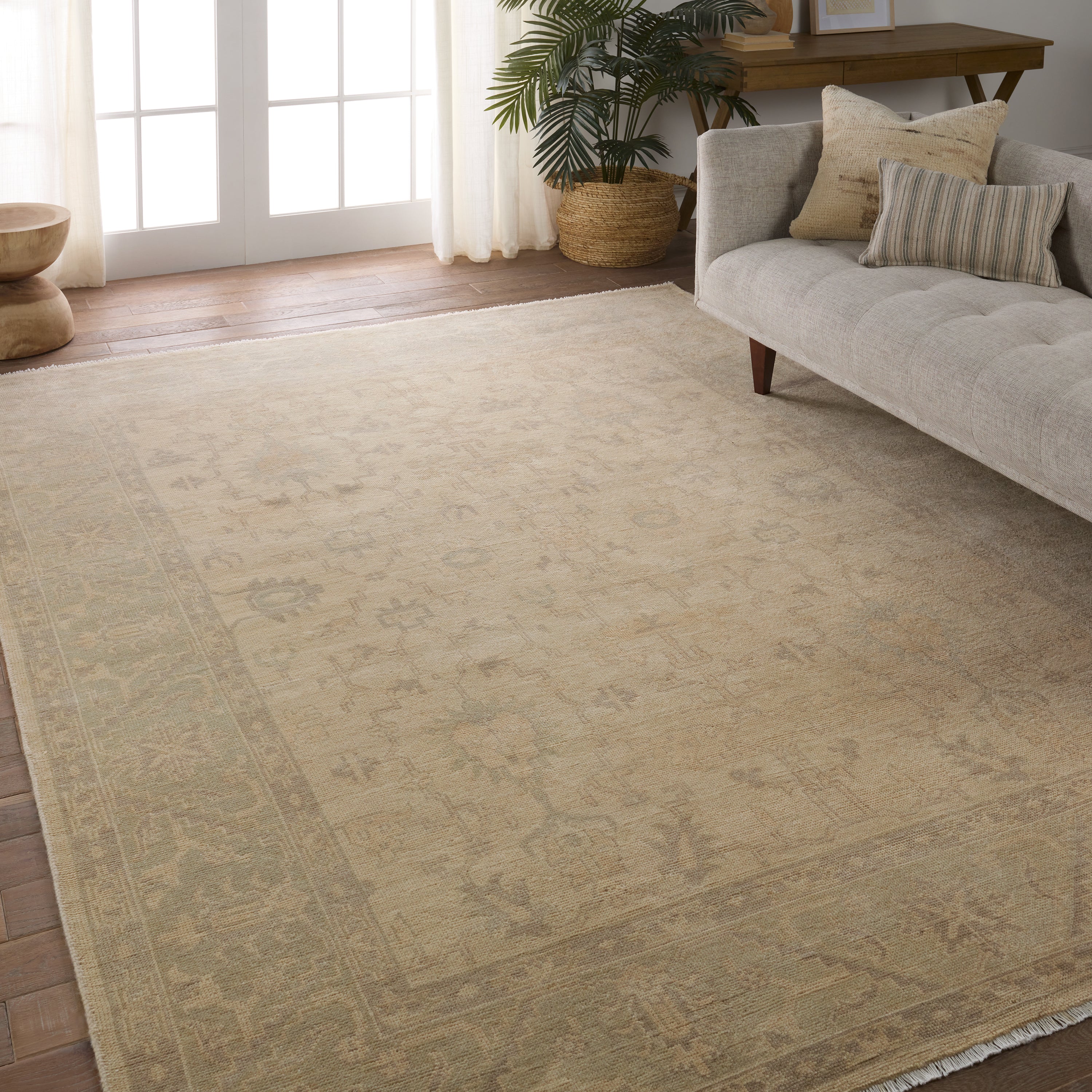 Featuring Eloquent Verity Natural Hand-Knotted Rug by Jaipur Living at Amethyst Home. The Eloquent collection emanates traditional elegance, lending a soft and serene look to transitional homes. The Verity area rug features a faded Oushak design in muted cream, light sage, and gray tones. This hand-knotted wool and viscose rug grounds living spaces with a classic, earthy look. Craf. Amethyst Home provides interior design, new construction, custom furniture, and area rugs in the Seattle metro area.