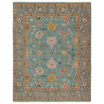 Featuring Everly Aloft Hand-Knotted Rug by Jaipur Living at Amethyst Home. The updated traditional Everly collection features Oushak-inspired designs in whimsical color palettes. The Aloft design features a lively colorway of blue, pink, yellow, navy, cream, peach, and taupe. This hand-knotted wool rug anchors living spaces with a fresh take on vintage style. The low, easy-care p. Amethyst Home provides interior design, new construction, custom furniture, and area rugs in the Charlotte metro area.