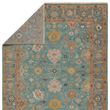 Featuring Everly Aloft Hand-Knotted Rug by Jaipur Living at Amethyst Home. The updated traditional Everly collection features Oushak-inspired designs in whimsical color palettes. The Aloft design features a lively colorway of blue, pink, yellow, navy, cream, peach, and taupe. This hand-knotted wool rug anchors living spaces with a fresh take on vintage style. The low, easy-care pi. Amethyst Home provides interior design, new construction, custom furniture, and area rugs in the Portland metro area.