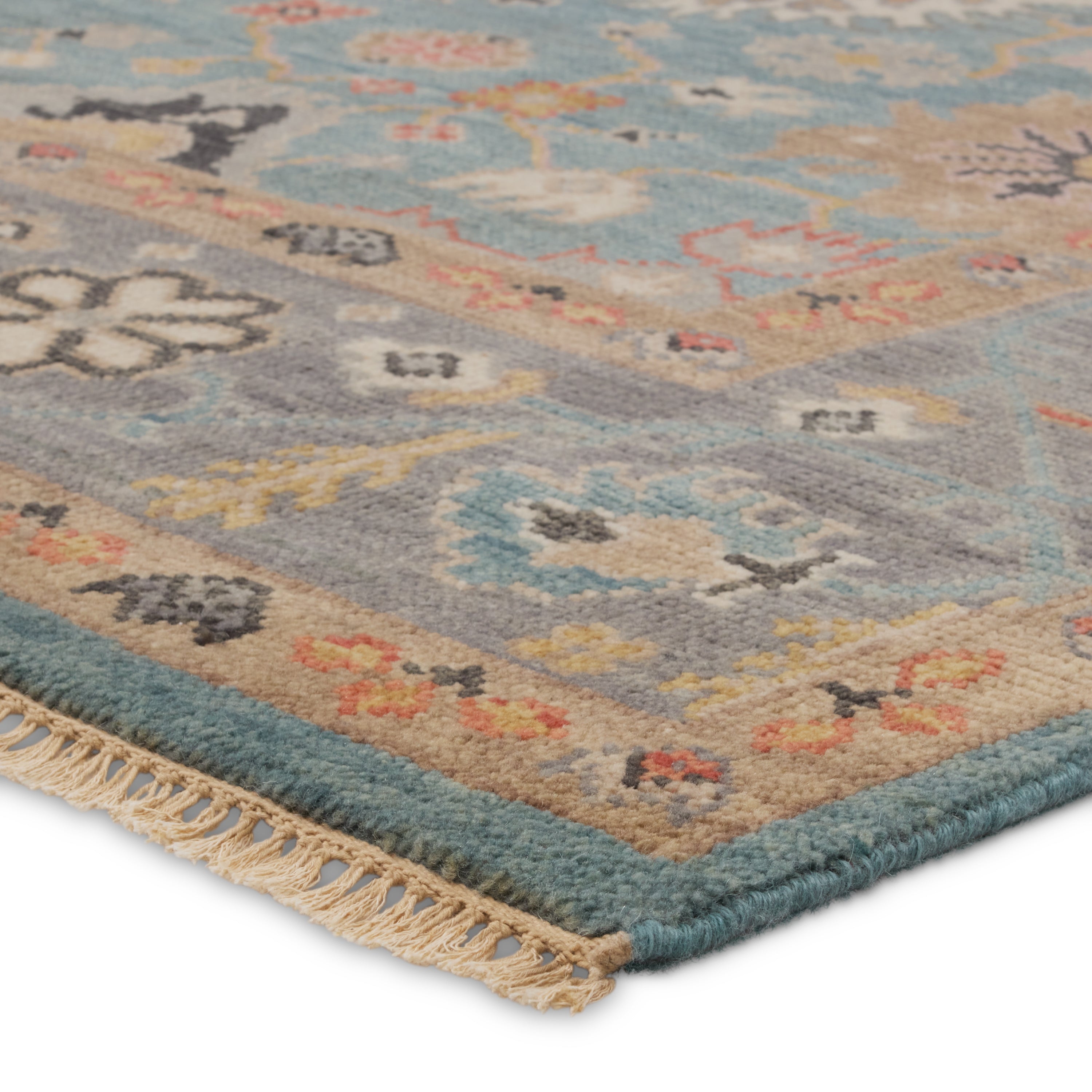 Featuring Everly Aloft Hand-Knotted Rug by Jaipur Living at Amethyst Home. The updated traditional Everly collection features Oushak-inspired designs in whimsical color palettes. The Aloft design features a lively colorway of blue, pink, yellow, navy, cream, peach, and taupe. This hand-knotted wool rug anchors living spaces with a fresh take on vintage style. The low, easy-care pil. Amethyst Home provides interior design, new construction, custom furniture, and area rugs in the Seattle metro area.
