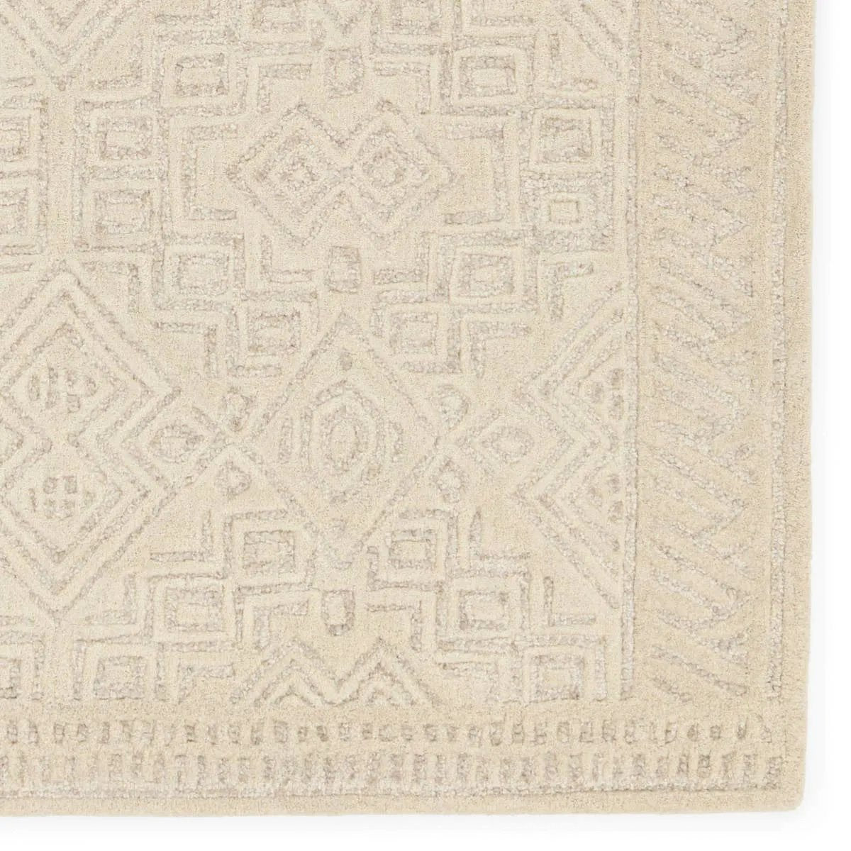 Featuring Farryn Ecco Rug by Jaipur Living at Amethyst Home. The Farryn Eccos boasts masterfully hand-tufted designs with stunning detail and versatile colorways. The Silva rug features a tribal-inspired, intricate geometric design in warm hues of tan and light gray. This transitional design is crafted of durable wool and complements a variety of styles, f. Amethyst Home provides interior design, new home construction design consulting, vintage area rugs, and lighting in the Washington metro area.