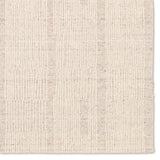 Featuring Finnigan Edher Rug by Jaipur Living at Amethyst Home. Handmade of 100% all-natural, undyed wool, the Edher rug enjoys an understated elegance that is satisfying in its simplicity. Rows of subtle organic stripes play across its field as delicate flecks of brown, accent the instinctive composition. As uncomplicated as it is extraordinary, it exu. Amethyst Home provides interior design, new home construction design consulting, vintage area rugs, and lighting in the Winter Garden metro area.