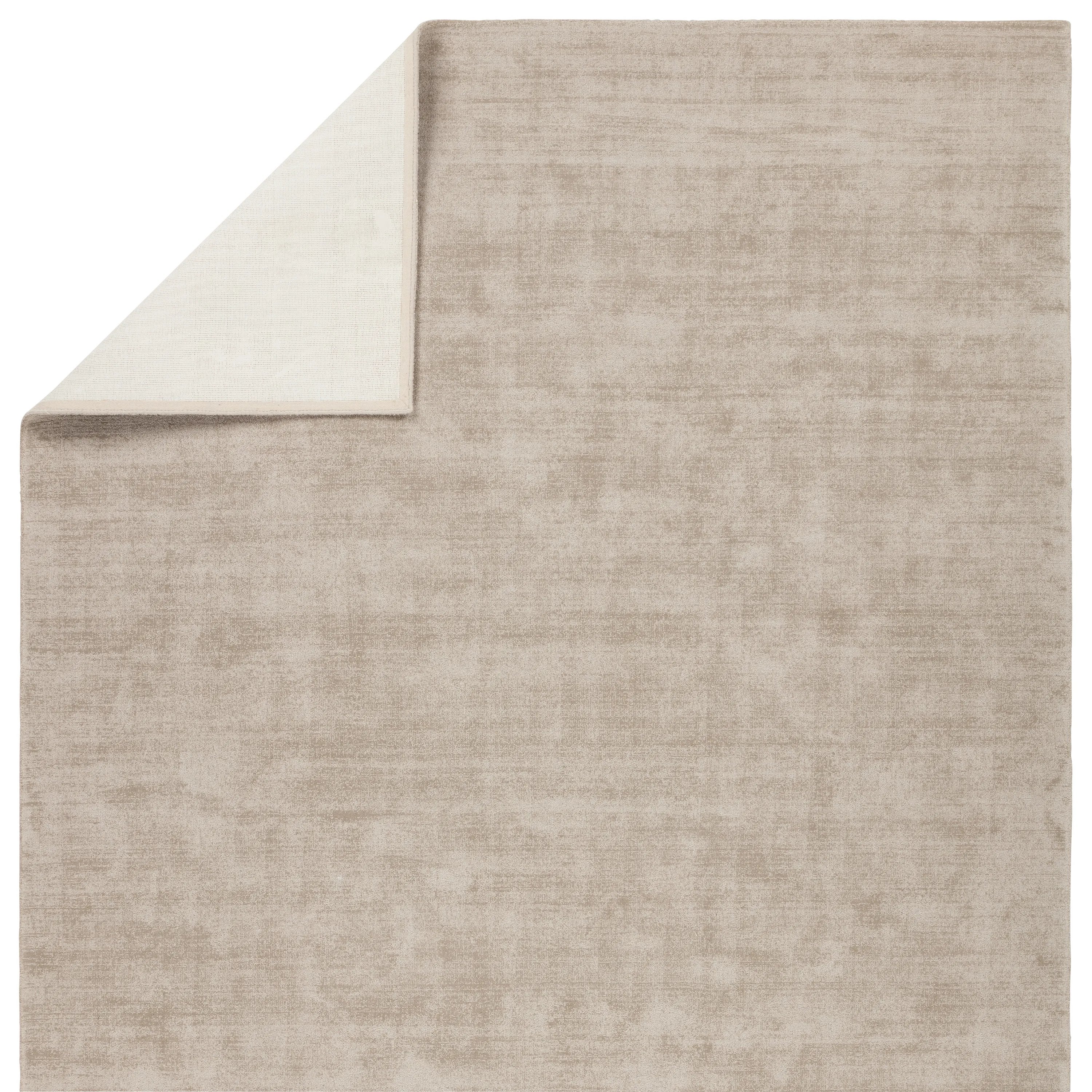 Featuring Fletcher Taupe Arcus Rug by Jaipur Living at Amethyst Home. The Fletcher collection combines effortless luxury with impressive durability. This handwoven assortment features lustrous, solid designs crafted of 100% PET yarn. The Arcus rug provides a taupe and cream colorway, cut and loop pile, and a subtle luster. The sturdy fibers allow this rug . Amethyst Home provides interior design, new home construction design consulting, vintage area rugs, and lighting in the Scottsdale metro area.