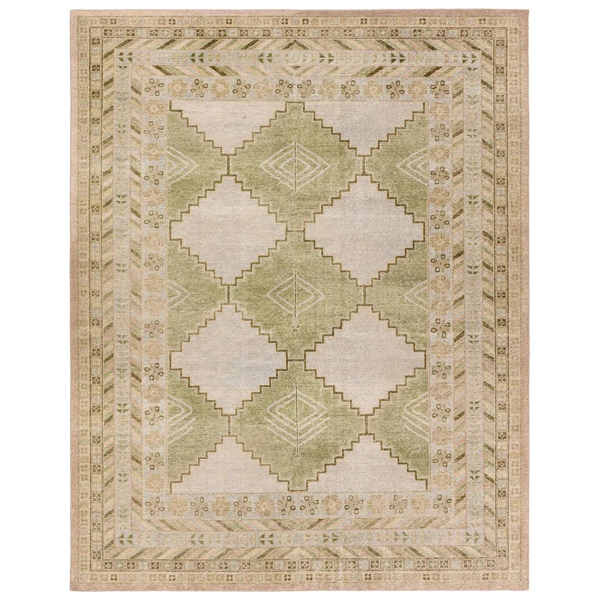 Featuring Gallant Enfield Hand-Knotted Rug by Jaipur Living at Amethyst Home. The updated traditional Gallant Enfield is an assortment of beautifully colored hand-knotted designs. The Enfield area rug showcases a vintage-inspired bordered medallion design in on-trend green, cream, light blue, and tan tones, stunningly distressed for texture and antiquity. C. Amethyst Home provides interior design, new home construction design consulting, vintage area rugs, and lighting in the Charlotte metro area.
