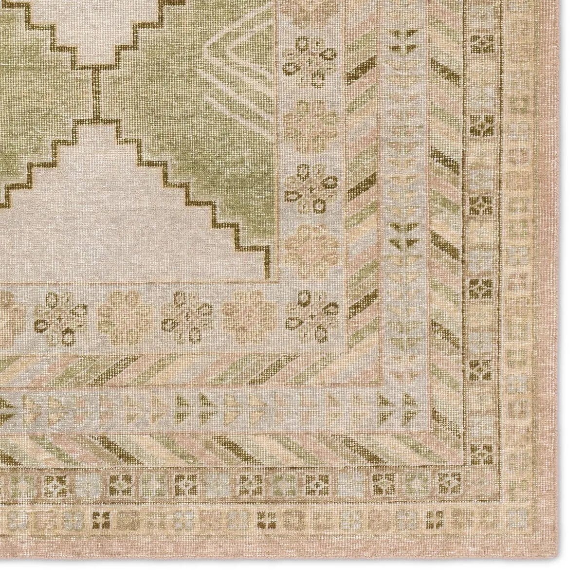 Featuring Gallant Enfield Hand-Knotted Rug by Jaipur Living at Amethyst Home. The updated traditional Gallant Enfield is an assortment of beautifully colored hand-knotted designs. The Enfield area rug showcases a vintage-inspired bordered medallion design in on-trend green, cream, light blue, and tan tones, stunningly distressed for texture and antiquity. C. Amethyst Home provides interior design, new home construction design consulting, vintage area rugs, and lighting in the Nashville metro area.