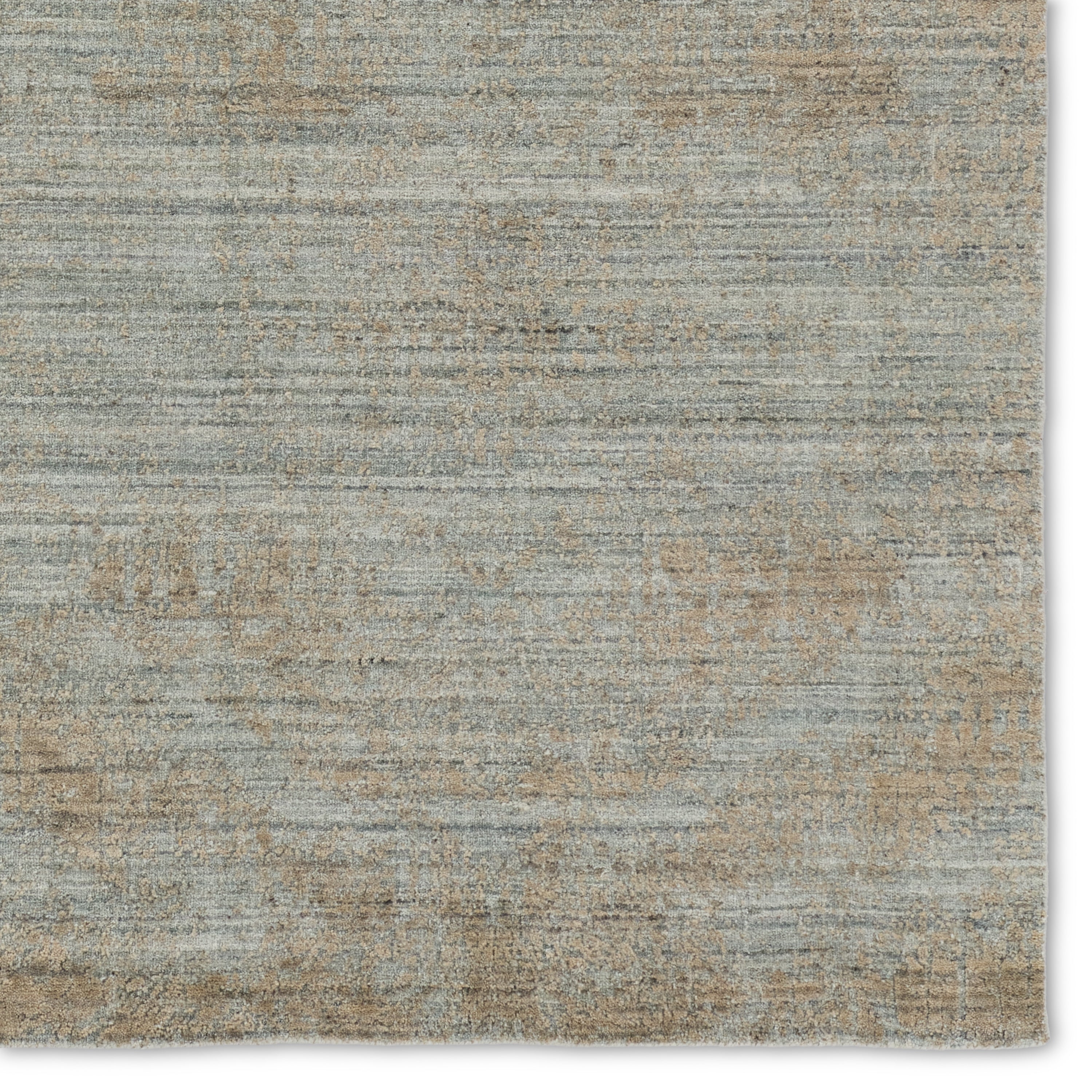 Featuring Genevieve Arano Rug by Jaipur Living at Amethyst Home. The elegant and modernized designs of the Genevieve collection feature an exquisite hand-loomed jacquard weave with stunning texture. The Arano rug boasts hand-embossed details in a balanced, versatile colorway of taupe, tan, gray, and cream tones. A blend of wool and soft viscose lends dimension and depth to this h. Amethyst Home provides interior design, new construction, custom furniture, and area rugs in the Park City metro area.