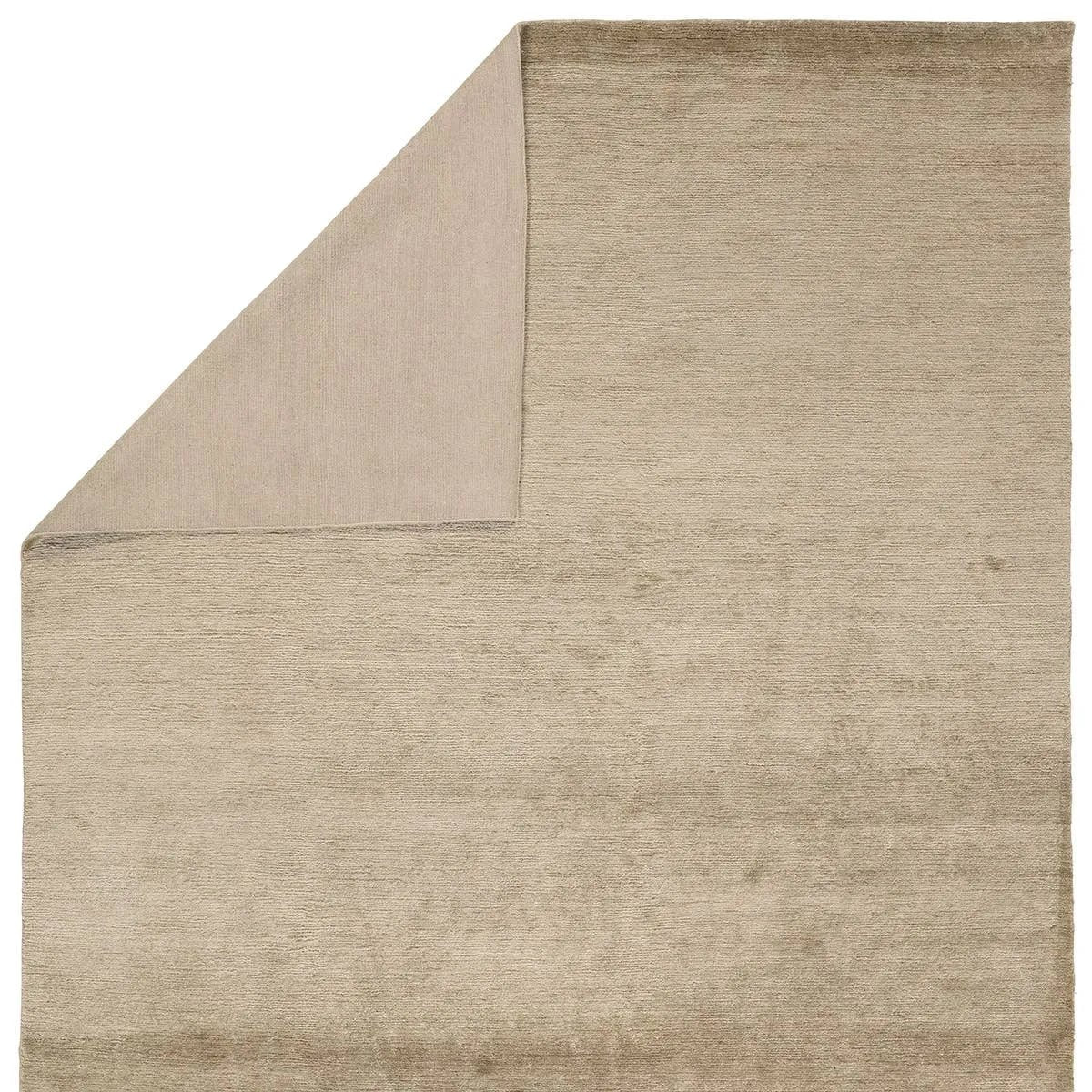 Featuring Hemara Cachemira Hand-Knotted Rug by Jaipur Living at Amethyst Home. Experience the artistry and refinement of the 100% Cashmere Hemara Cachemira. Hand knotted by skilled artisans in India, these rugs go beyond floor coverings; they are true masterpieces. The Cachemira design tells a story of plush comfort and elegance through carefully crafted Ti. Amethyst Home provides interior design, new home construction design consulting, vintage area rugs, and lighting in the Charlotte metro area.