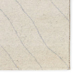 Featuring Indira Laverna Hand-Knotted Rug by Jaipur Living at Amethyst Home. Rich in detail and plush underfoot, the Indira Laverna is made up of neutral-toned modern Moroccan styles. The Laverna area rug features a slight sheen and luxurious hand-knotted construction of natural wool and viscose. A light trellis design provides geometric interest in a silve. Amethyst Home provides interior design, new home construction design consulting, vintage area rugs, and lighting in the Nashville metro area.