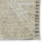 Featuring Indira Merida Hand-Knotted Rug by Jaipur Living at Amethyst Home. Rich in detail and plush underfoot, the Indira Merida is made up of neutral-toned modern Moroccan styles. The Merida area rug features a slight sheen and luxurious hand-knotted construction of natural wool and viscose. A distressed trellis design provides geometric interest in an i. Amethyst Home provides interior design, new home construction design consulting, vintage area rugs, and lighting in the Des Moines metro area.
