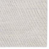 Featuring Indira Zivian Hand-Knotted Rug by Jaipur Living at Amethyst Home. Rich in detail and plush underfoot, the Indira Zivian is made up of neutral-toned modern Moroccan styles. The Zivian area rug features a slight sheen and luxurious hand-knotted construction of natural wool and viscose. A soft linear design provides geometric interest in an light bl. Amethyst Home provides interior design, new home construction design consulting, vintage area rugs, and lighting in the Alpharetta metro area.