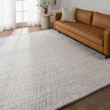 Featuring Indira Zivian Hand-Knotted Rug by Jaipur Living at Amethyst Home. Rich in detail and plush underfoot, the Indira Zivian is made up of neutral-toned modern Moroccan styles. The Zivian area rug features a slight sheen and luxurious hand-knotted construction of natural wool and viscose. A soft linear design provides geometric interest in an light blue hu. Amethyst Home provides interior design, new home construction design consulting, vintage area rugs, and lighting in the Tampa metro area.