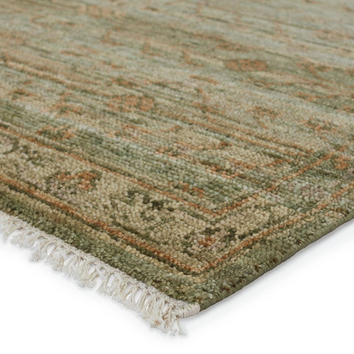 Featuring Jinsen Augusta Hand-Knotted Rug by Jaipur Living at Amethyst Home. The hand-knotted Jinsen Augusta features a fresh incarnation of the vintage Turkish textile look. Classic in pattern and modern in color, the Augusta rug boasts a beautiful palette of green, burnished gold, and hints of taupe featuring distinct dye-lot details and subtle fringe. This a. Amethyst Home provides interior design, new home construction design consulting, vintage area rugs, and lighting in the Miami metro area.