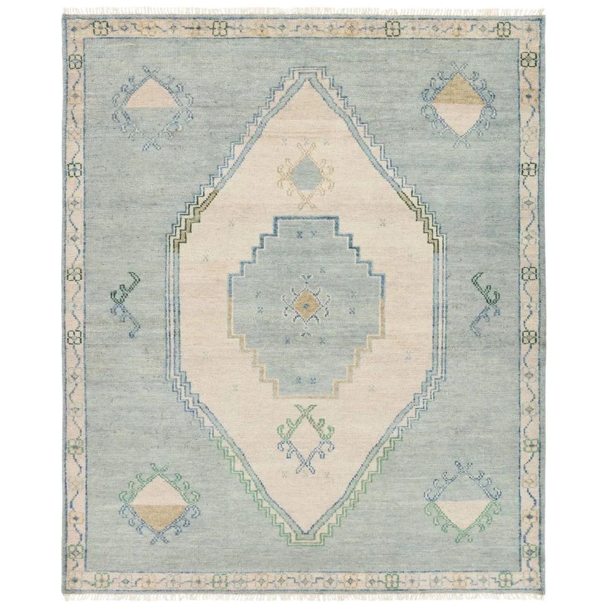 Featuring Jinsen Fayola Rug by Jaipur Living at Amethyst Home. The hand-knotted Jinsen collection features a fresh incarnation of the vintage Turkish textile look. Classic in pattern and modern in color, the Alamo rug boasts a beautiful palette of cream, beige, gold, and brown, featuring distinct dye-lot details and subtle fringe. This artisan-crafted medallio. Amethyst Home provides interior design, new home construction design consulting, vintage area rugs, and lighting in the Boston metro area.