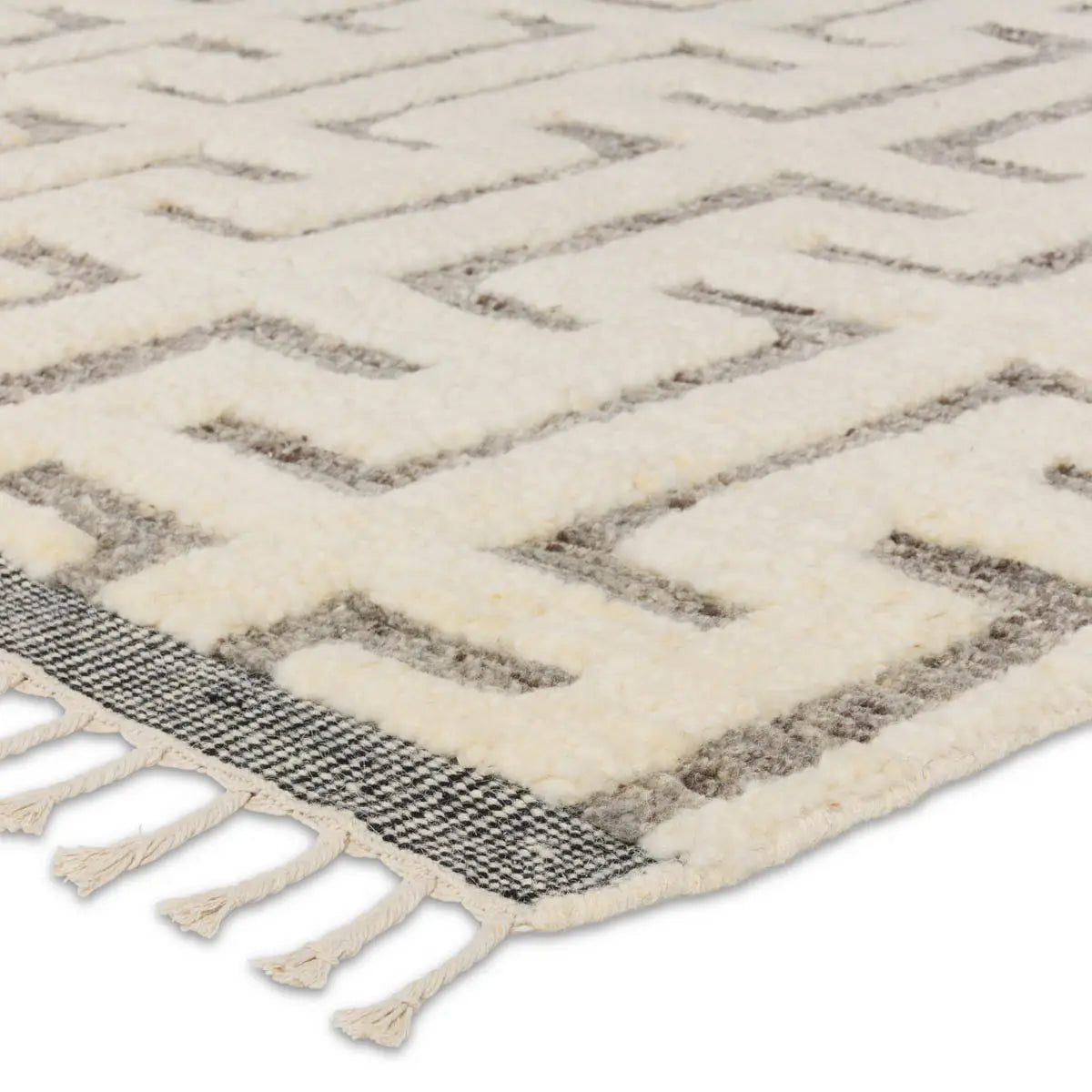 Featuring Keoka Semra Rug by Jaipur Living at Amethyst Home. The Keoka Semra Rug boasts a fresh take on classic Afghani hand-knotted textiles. In rich, grounding tones of gray and ivory, the stylish contrast of the rug anchors room with bold yet neutral appeal. The texture-rich wool pile features a ribbed construction that lends unique linear details to the grounding solid design. Braided fring. Amethyst Home provides interior design services, furniture, rugs, and lighting in the Miami metro area.