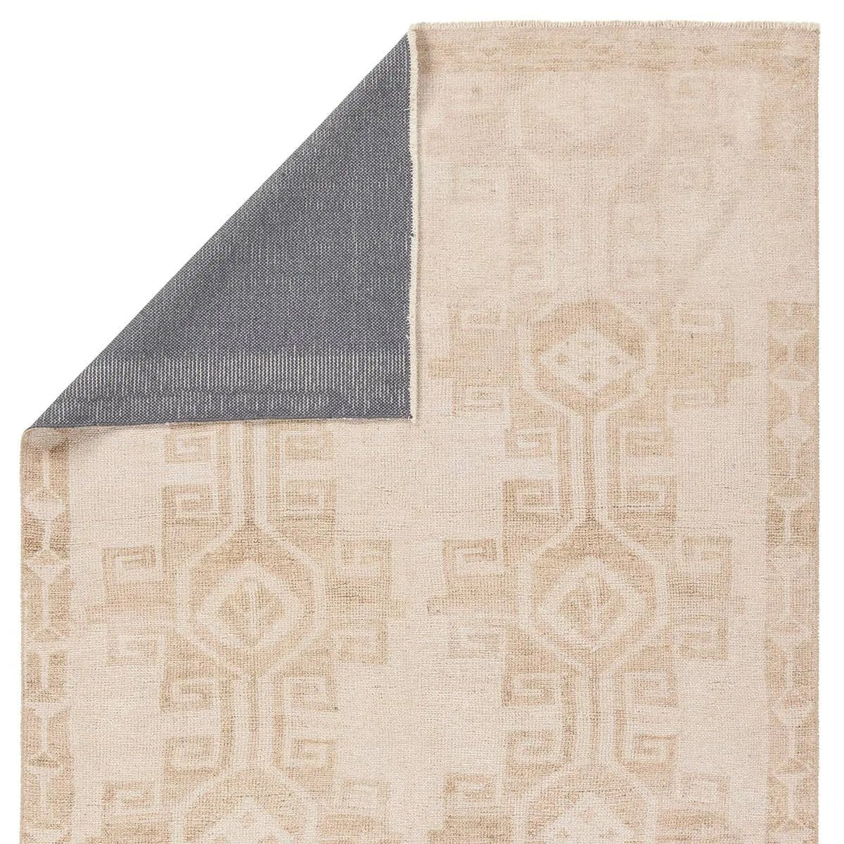 Featuring Lumal Barine Rug by Jaipur Living at Amethyst Home. Distressed, vintage designs offer an elevated tone for the Lumal Collection. The Barine rug features Southwestern-inspired medallions and a thin geometric border in tones of tan and cream. This machine washable rug is stain resistant and easy to clean, perfect for homes with children and pets. Th. Amethyst Home provides interior design, new home construction design consulting, vintage area rugs, and lighting in the Charlotte metro area.