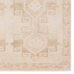 Featuring Lumal Barine Rug by Jaipur Living at Amethyst Home. Distressed, vintage designs offer an elevated tone for the Lumal Collection. The Barine rug features Southwestern-inspired medallions and a thin geometric border in tones of tan and cream. This machine washable rug is stain resistant and easy to clean, perfect for homes with children and pets. Amethyst Home provides interior design, new home construction design consulting, vintage area rugs, and lighting in the Winter Garden metro area.