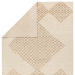 Featuring Merzouga Sarenthia Hand-Knotted Rug by Jaipur Living at Amethyst Home. A stunning array of globally inspired designs in neutral tones define the handknotted Merzouga by Heja Home Sarenthia. The Moroccan-inspired Sarenthia design showcases several checkered diamonds in cream and taupe tones. The 100% wool pile is soft underfoot and inherently stain. Amethyst Home provides interior design, new home construction design consulting, vintage area rugs, and lighting in the Nashville metro area.