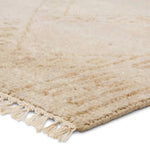 Featuring Merzouga Milada Hand-Knotted Rug by Jaipur Living at Amethyst Home. A stunning array of globally inspired designs in neutral tones define the handknotted Merzouga by Heja Home Milada. The Moroccan-inspired Milada design showcases geometric diamond pattern in cream and tan tones. The wool pile is soft underfoot and inherently stain-resistant. H. Amethyst Home provides interior design, new home construction design consulting, vintage area rugs, and lighting in the Winter Garden metro area.