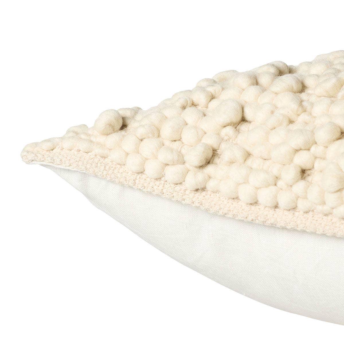 Featuring Origins Freya Pillow by Jaipur Living at Amethyst Home. The textural finish of the Freya pillow is inspired by grape agate, a rare mineral found in Mamuju, a small area of Indonesia. Handcrafted of 100% cream wool, this throw pillow perfectly accents modern indoor spaces.Indoor Pillow100% WoolFRE02 Origins FreyaSpot clean only.. Amethyst Home provides interior design, new home construction design consulting, vintage area rugs, and lighting in the Houston metro area.