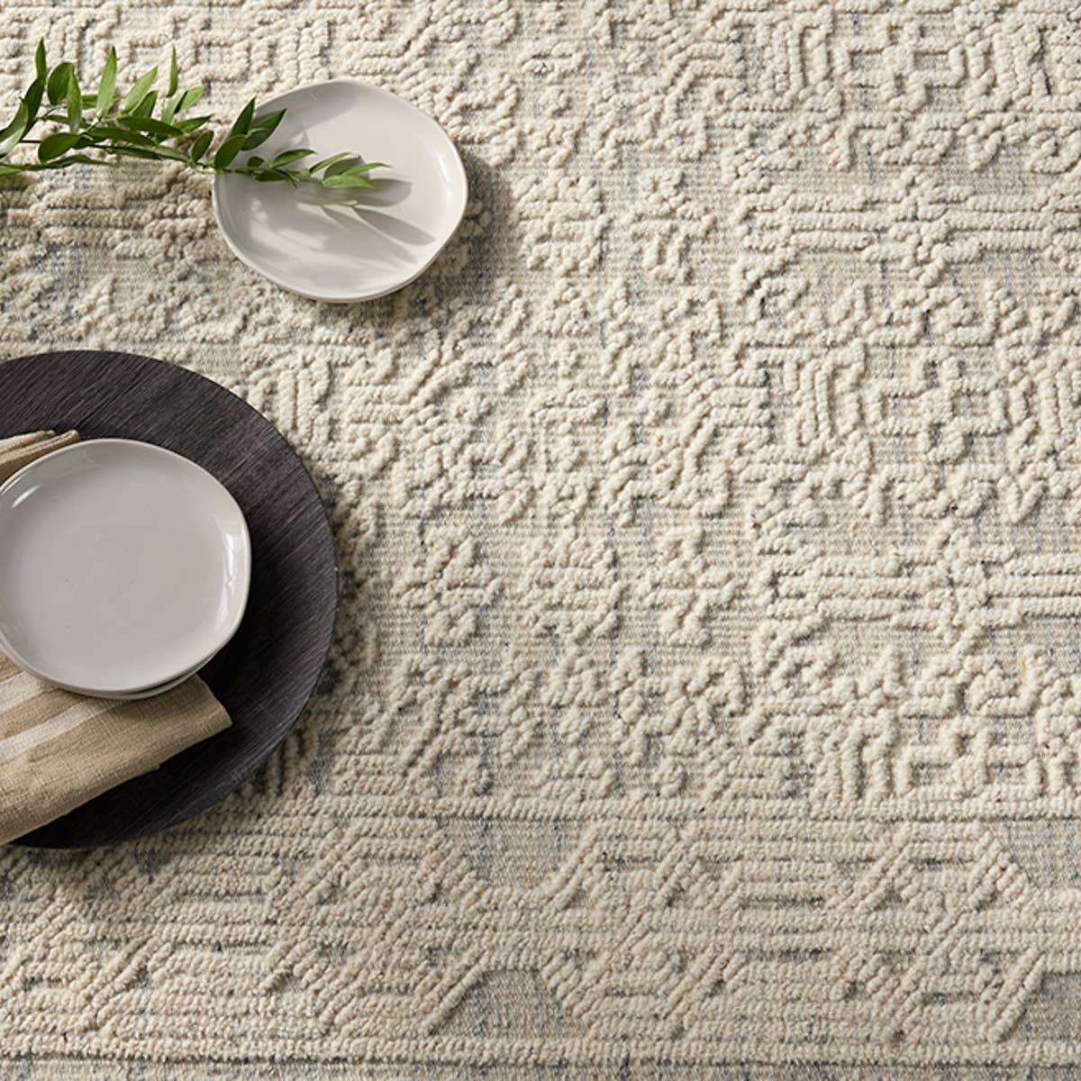 Featuring Reign Ria Rug by Jaipur Living at Amethyst Home. The captivating Reign Ria Rug introduces detail-rich design and inviting high-low pile to contemporary and traditional homes alike. Hand knotted by skilled artisans, the Ria wool rug creates depth and dimension with a cozy inviting cream and light blue palette. Subtle ridges created by the intricate pattern offer soft, tempting texture. Amethyst Home provides interior design services, furniture, rugs, and lighting in the Dallas metro area.