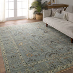 Featuring Rhapsody Nysa Hand-Knotted Rug by Jaipur Living at Amethyst Home. The Rhapsody collection features heirloom-quality designs of stunningly abrashed Old World patterns. The Nysa area rug boasts a beautifully washed floral motif with a decorative border. The blue tone is accented with rich green, tan, navy, and cream hues for added depth and intrigue. This durable wool handkn. Amethyst Home provides interior design, new construction, custom furniture, and area rugs in the Austin metro area.