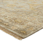 Featuring Rhapsody Gehenna Hand-Knotted Rug by Jaipur Living at Amethyst Home. The Rhapsody Gehenna features heirloom-quality designs of stunningly abrashed Old World patterns. The Gehenna area rug boasts a beautifully distressed medallion motif with a decorative border and floral detailing. The gray and brown tones are accented with light blue, sage, beig. Amethyst Home provides interior design, new home construction design consulting, vintage area rugs, and lighting in the Alpharetta metro area.