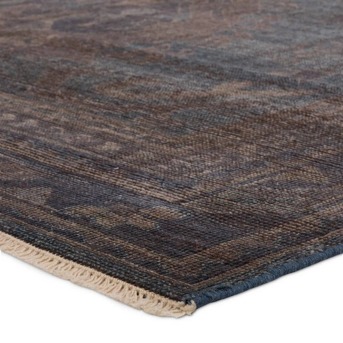 Featuring Rhapsody Jodion Hand-Knotted Rug by Jaipur Living at Amethyst Home. The Rhapsody Jodion features heirloom-quality designs of stunningly abrashed Old World patterns. The Jodion area rug boasts a beautifully distressed dual-medallion motif with a decorative, multi-layered border and geometric detailing. The blue, brown, and gray hues add depth and . Amethyst Home provides interior design, new home construction design consulting, vintage area rugs, and lighting in the Alpharetta metro area.