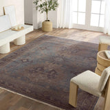 Featuring Rhapsody Jodion Hand-Knotted Rug by Jaipur Living at Amethyst Home. The Rhapsody Jodion features heirloom-quality designs of stunningly abrashed Old World patterns. The Jodion area rug boasts a beautifully distressed dual-medallion motif with a decorative, multi-layered border and geometric detailing. The blue, brown, and gray hues add depth and i. Amethyst Home provides interior design, new home construction design consulting, vintage area rugs, and lighting in the Nashville metro area.