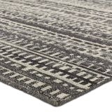Featuring Rize Jamaal Hand-Knotted Rug by Jaipur Living at Amethyst Home. The Rize collection offers intricate and delicately designed global patterns to the modern home. The luxurious Jamaal area rug showcases a striped, linear motif in a classic gray, cream, and black colorway. This accent's hand-knotted wool construction ensures timeless durability and a stunning presence in bohe. Amethyst Home provides interior design, new construction, custom furniture, and area rugs in the Dallas metro area.