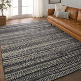 Featuring Rize Jamaal Hand-Knotted Rug by Jaipur Living at Amethyst Home. The Rize collection offers intricate and delicately designed global patterns to the modern home. The luxurious Jamaal area rug showcases a striped, linear motif in a classic gray, cream, and black colorway. This accent's hand-knotted wool construction ensures timeless durability and a stunning presence i. Amethyst Home provides interior design, new construction, custom furniture, and area rugs in the Laguna Beach metro area.