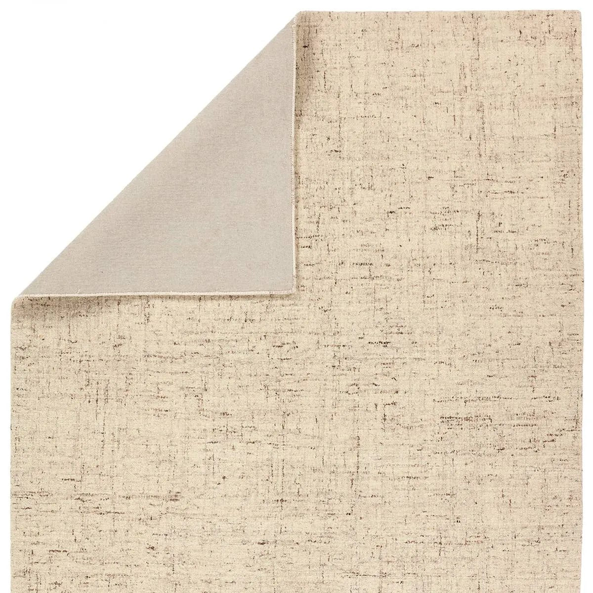 Featuring Salix Macklin Rug by Jaipur Living at Amethyst Home. The Salix Macklin boasts an assortment of exceptionally crafted, not-so-solid designs. The hand-tufted Macklin rug features woolen yarn spun by hand with tiny amounts of varied colors. The resulting effect is hyper-textural and perfect for easy, versatile styling. This cream and brown area rug d. Amethyst Home provides interior design, new home construction design consulting, vintage area rugs, and lighting in the Charlotte metro area.