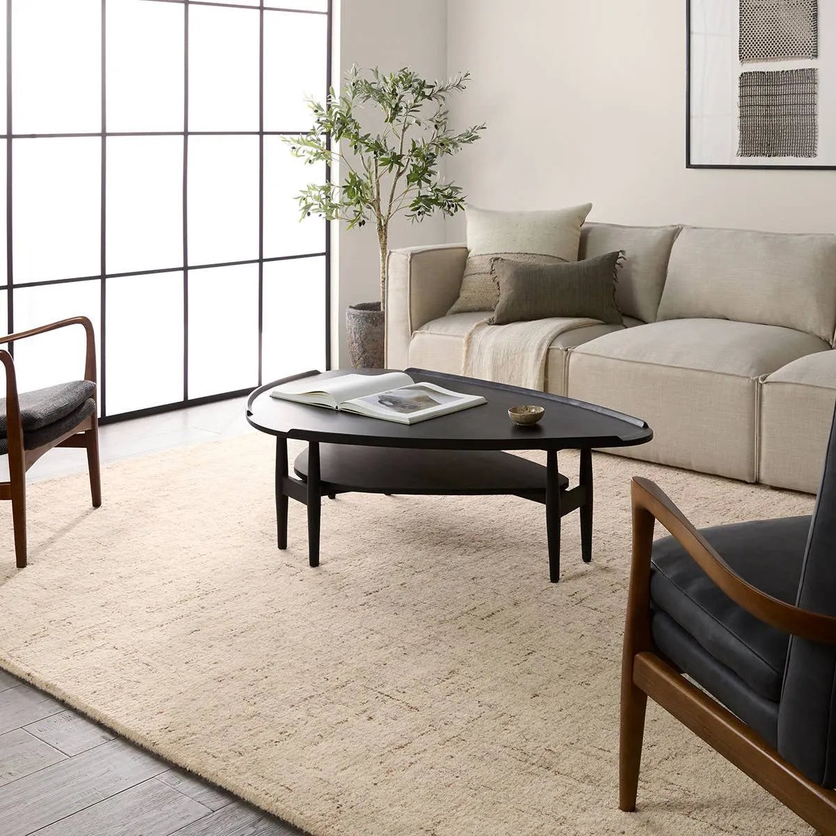 Featuring Salix Macklin Rug by Jaipur Living at Amethyst Home. The Salix Macklin boasts an assortment of exceptionally crafted, not-so-solid designs. The hand-tufted Macklin rug features woolen yarn spun by hand with tiny amounts of varied colors. The resulting effect is hyper-textural and perfect for easy, versatile styling. This cream and brown area rug. Amethyst Home provides interior design, new home construction design consulting, vintage area rugs, and lighting in the Los Angeles metro area.