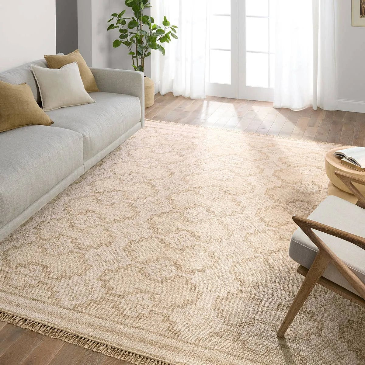 Featuring Sevak Elmast Hand-Knotted Rug by Jaipur Living at Amethyst Home. The Sevak collection skillfully emulates vintage designs with the simplified and tonal twist of modernity mixed into the motifs. These Kars-inspired patterns have the uncanny ability to both ground a space with inviting and comfortable appeal, while also lending the perfect amount. Amethyst Home provides interior design, new home construction design consulting, vintage area rugs, and lighting in the Laguna Beach metro area.