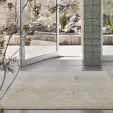 Featuring Sevak Ismail Hand-Knotted Rug by Jaipur Living at Amethyst Home. The hand-knotted Sevak Ismail emulates vintage rugs with traditional Turkish patterns, distressing, and a neutral color palette for versatility. The Ismail design features mini-medallions and a subtle border in tones of tan, cream, and brown. The fringe adds a global charm that delights. Amethyst Home provides interior design, new home construction design consulting, vintage area rugs, and lighting in the Boston metro area.