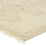 Featuring Sevak Ismail Hand-Knotted Rug by Jaipur Living at Amethyst Home. The hand-knotted Sevak Ismail emulates vintage rugs with traditional Turkish patterns, distressing, and a neutral color palette for versatility. The Ismail design features mini-medallions and a subtle border in tones of tan, cream, and brown. The fringe adds a global charm that delig. Amethyst Home provides interior design, new home construction design consulting, vintage area rugs, and lighting in the Charlotte metro area.