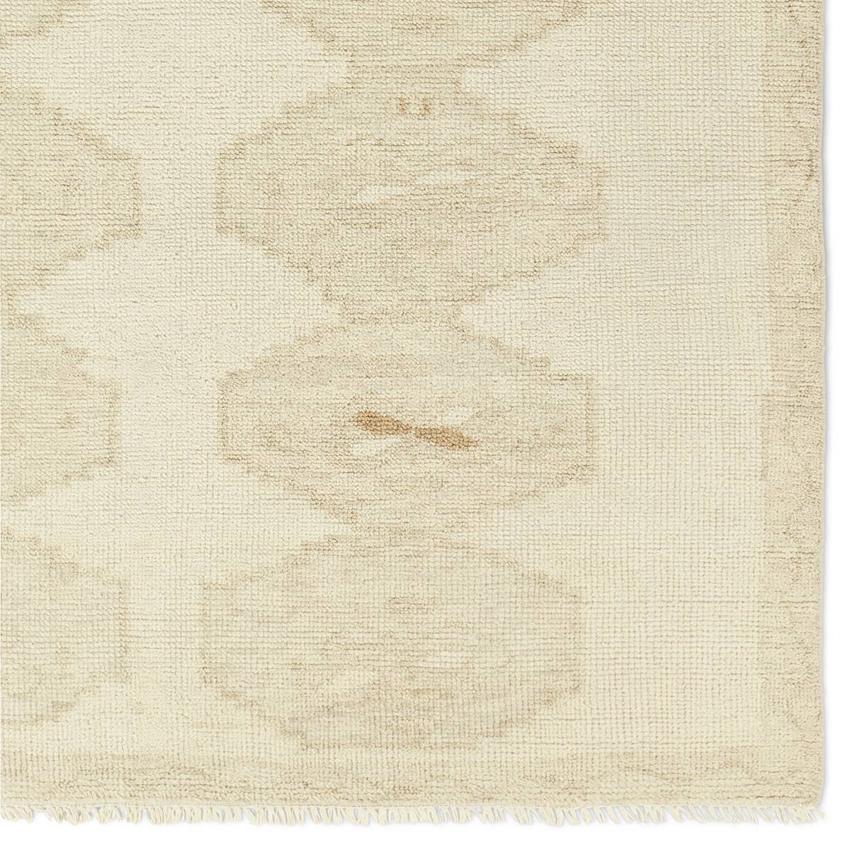 Featuring Sevak Ismail Hand-Knotted Rug by Jaipur Living at Amethyst Home. The hand-knotted Sevak Ismail emulates vintage rugs with traditional Turkish patterns, distressing, and a neutral color palette for versatility. The Ismail design features mini-medallions and a subtle border in tones of tan, cream, and brown. The fringe adds a global charm that de. Amethyst Home provides interior design, new home construction design consulting, vintage area rugs, and lighting in the Laguna Beach metro area.