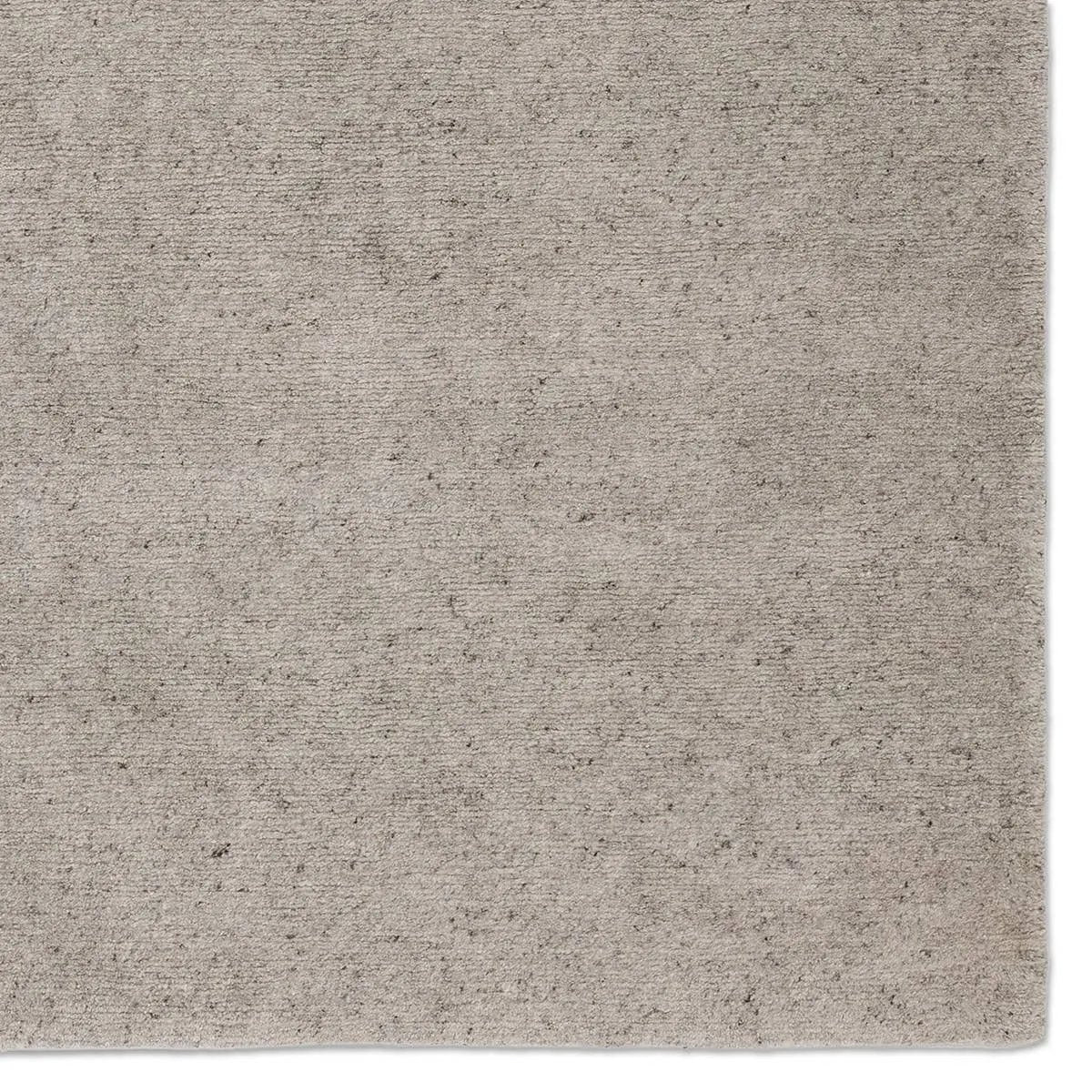 Featuring Si Blanc Theia Hand-Knotted Rug by Jaipur Living at Amethyst Home. The Si Blanc Collection seamlessly blends the sumptuous fleece of Alpaca and the resilience of New Zealand Wool, creating a harmonious symphony of softness and durability. The Theia design is crafted with precision using gray Tibetan hand knots, embodying simplicity and soft sophi. Amethyst Home provides interior design, new home construction design consulting, vintage area rugs, and lighting in the Alpharetta metro area.