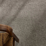 Featuring Si Blanc Theia Hand-Knotted Rug by Jaipur Living at Amethyst Home. The Si Blanc Collection seamlessly blends the sumptuous fleece of Alpaca and the resilience of New Zealand Wool, creating a harmonious symphony of softness and durability. The Theia design is crafted with precision using gray Tibetan hand knots, embodying simplicity and soft sophistic. Amethyst Home provides interior design, new home construction design consulting, vintage area rugs, and lighting in the Dallas metro area.