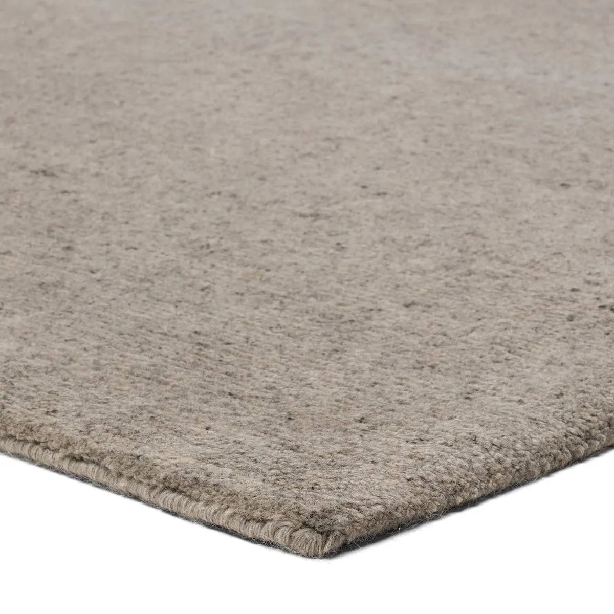 Featuring Si Blanc Theia Hand-Knotted Rug by Jaipur Living at Amethyst Home. The Si Blanc Collection seamlessly blends the sumptuous fleece of Alpaca and the resilience of New Zealand Wool, creating a harmonious symphony of softness and durability. The Theia design is crafted with precision using gray Tibetan hand knots, embodying simplicity and soft sophis. Amethyst Home provides interior design, new home construction design consulting, vintage area rugs, and lighting in the San Diego metro area.