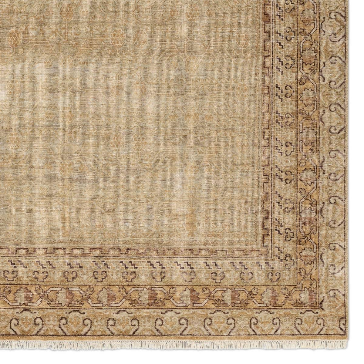Featuring Serenity Hand-Knotted Rug by Jaipur Living at Amethyst Home. Whimsical colorways combine with the opulent detail of a traditional-inspired pattern?the Serenity represents nostalgia and progression, heritage and the contemporary. The Serenity rug features a heavily distressed trellis and intricate border design with a gold, brown, and beige colorwa. Amethyst Home provides interior design, new home construction design consulting, vintage area rugs, and lighting in the Park City metro area.