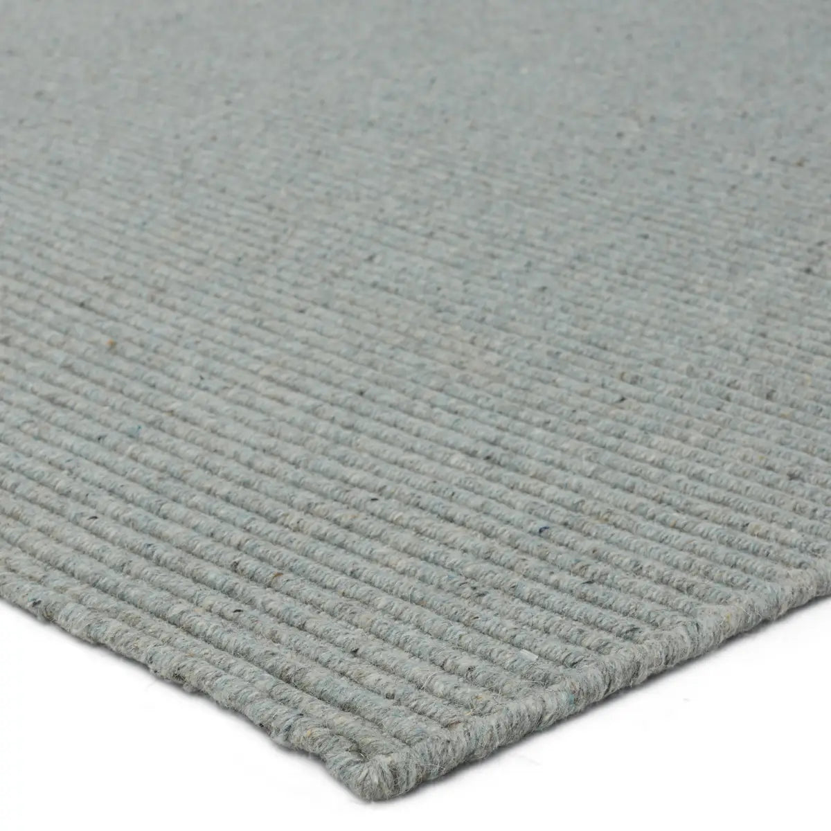 Featuring Strada Shyre Blue Rug by Jaipur Living at Amethyst Home. The Strada Shyre Blue Rug features a unique texture and casual comfort that effortlessly grounds spaces with a solid hue. This handwoven wool rug is crafted from undyed yarn for a distinctive, neutral colorway with natural variation for a bit of dimension. The Shyre rug offers a cozy gray colorway with flecks of brown throu. Amethyst Home provides interior design services, furniture, rugs, and lighting in the Des Moines metro area.