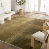 Featuring Tapeten Achala Hand-Knotted Rug by Jaipur Living at Amethyst Home. The hand-knotted Tapeten Achala features globally inspired designs that evoke a balance of tradition and modernity. The Achala pattern stuns with a high-low effect that distinguishes the olive green, geometric, striped pattern. Naturally water- and stain-resistant, the 100% wool pil. Amethyst Home provides interior design, new home construction design consulting, vintage area rugs, and lighting in the Monterey metro area.