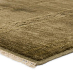 Featuring Tapeten Achala Hand-Knotted Rug by Jaipur Living at Amethyst Home. The hand-knotted Tapeten Achala features globally inspired designs that evoke a balance of tradition and modernity. The Achala pattern stuns with a high-low effect that distinguishes the olive green, geometric, striped pattern. Naturally water- and stain-resistant, the 100% wool pi. Amethyst Home provides interior design, new home construction design consulting, vintage area rugs, and lighting in the San Diego metro area.