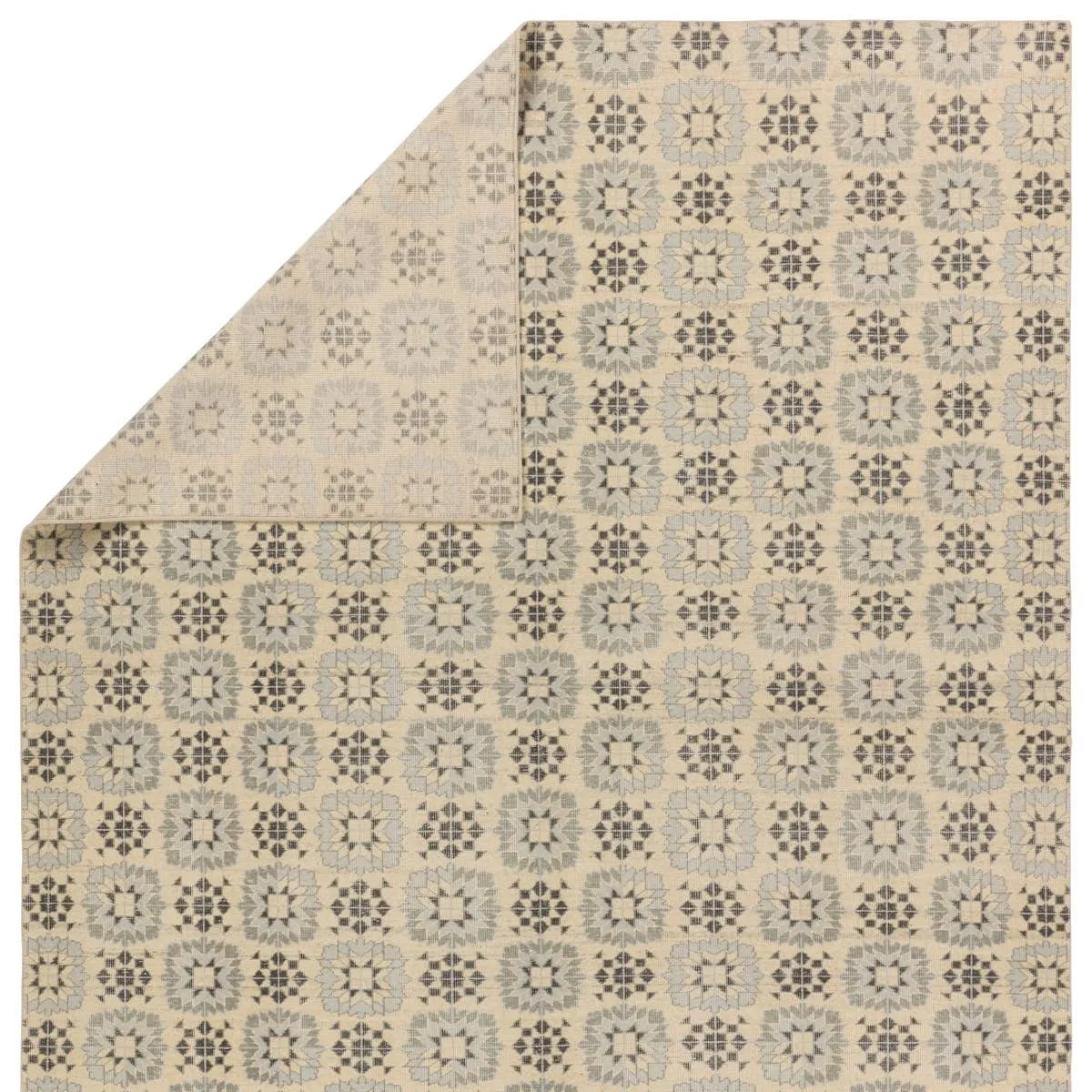 Featuring Tessera Crystal Rug by Jaipur Living at Amethyst Home. Tessera by Verde Home is a contemporary statement of timeless patterns inspired by the repetitious and clean-lined beauty of tile motifs. Hand knotted of quality wool, the sheared pile of these artisan-crafted rugs provides a texture reminiscent of vintage textiles that also brilliantly displ. Amethyst Home provides interior design, new home construction design consulting, vintage area rugs, and lighting in the Washington metro area.